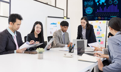 Group of business people working together with dashboard analysis and data management a meeting table in office.