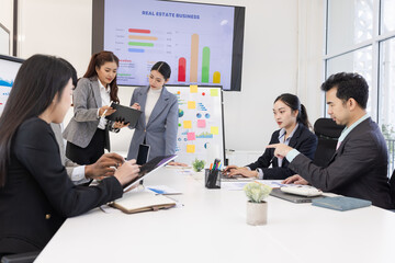 Group of business people working together with dashboard analysis and data management a meeting table in office.