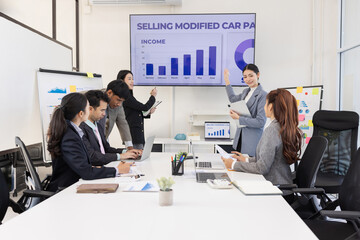 Group of business people working together with dashboard analysis and data management a meeting...