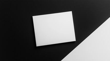 Blank white card on a flat surface, symbolizing simplicity and clarity in design.