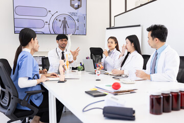 Fototapeta premium Group of Asian doctor working together and brainstorm at the clinic, Healthcare and medical meeting concept.