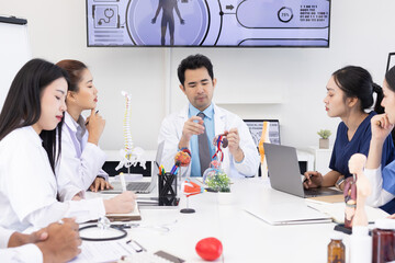 Fototapeta premium Group of Asian doctor working together and brainstorm at the clinic, Healthcare and medical meeting concept.