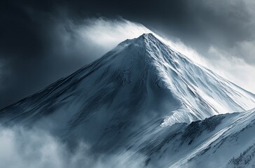Majestic Mountain Peak: An imposing snow-capped mountain peak rises into the stormy sky. Capturing the raw power and desolate beauty of the natural world.