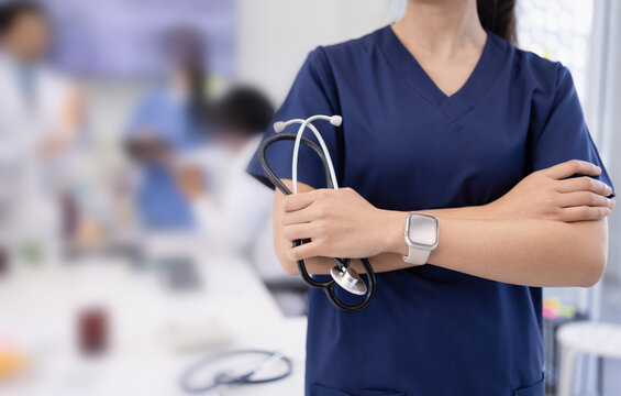 Female doctor holding stethoscope, Healthcare and medical concept.