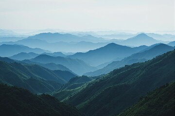 Naklejka premium Scenic mountain landscape with misty blue layers of rolling hills, creating a peaceful and creative background. Ai generative