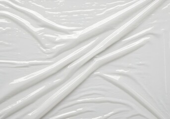 Fototapeta premium Elegant White Vinyl Fabric with Soft Folds and Shiny Surface