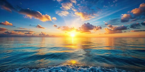 Obraz premium Serene Sunrise Ocean: Calm Water, Expansive Sky, Tranquil Nature Scene - Stock Photo