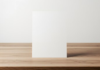 Display of White Paper on Wooden Table with Minimalist Background