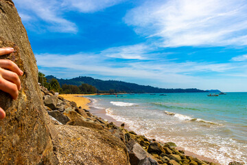 Tropical paradise Khao Lak Beach turquoise water and rocks Thailand.