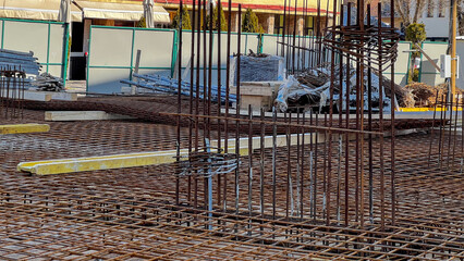 Reinforced steel framework at a construction site, urban development, engineering project, modern...