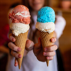 Sweet Summer Treat,Holding a Delicious Ice Cream Cone with Blurred Background