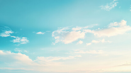 Obraz premium A serene summer sky featuring a gradient of soft blue and white hues, capturing the peaceful beauty of a bright, airy day on the horizon