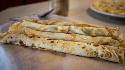 Golden Brown Rolled Crepes Filled with Delicious Sweet or Savory Fillings