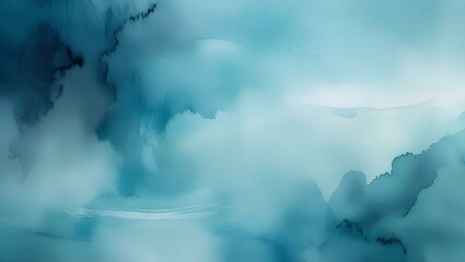 Fluffy white clouds drift across a bright blue sky, with fog obscuring distant mountain peaks
