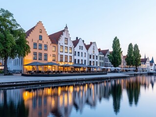 Naklejka premium Serene evening at a picturesque canal-side restaurant in Bruges, reflecting buildings