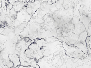 Polished white marble with gray veins forming an abstract design.