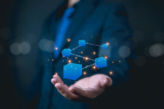 Blockchain technology to secure data, Technology linked together concept, Businessman shows block connecting to blockchain global networking, Digital Data Management, Decentralized Transactions - Powered by Adobe