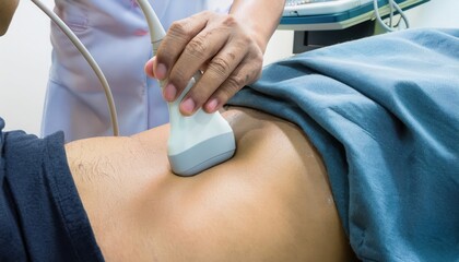 Medical ultrasound procedure on a patient's abdomen for diagnosis.