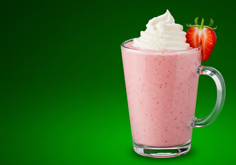 Pink Strawberry Milkshake with Whipped Cream in Glass Cup Against Green Background