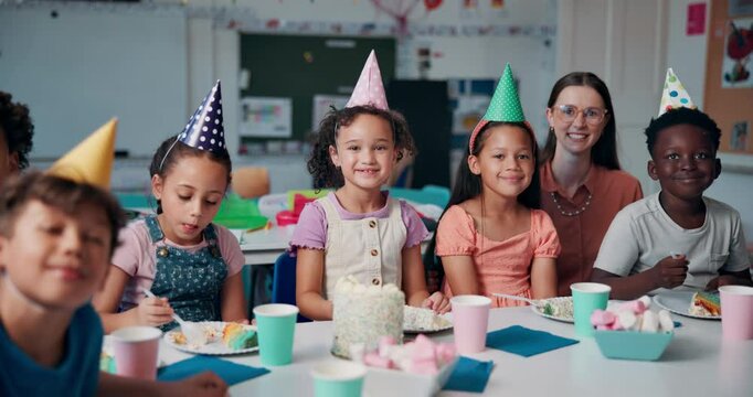 Face, children and birthday party with cake at school, teacher or friends with hats together. Smile, kids and eating food at celebration, special event and social gathering with students in classroom
