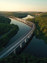 Fototapeta premium Elevated highway cutting through dense forest landscape at dawn