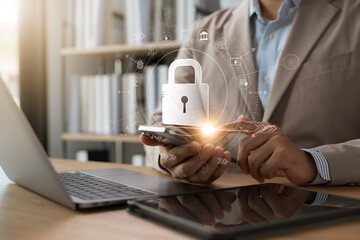 Cyber ​​Security Protecting sensitive business information, Businessman using laptops and tablets Smart security software, Protecting financial data, Global network protection.