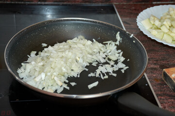 Close-up of fresh vegetables sautéing in a pan for a delicious homemade dish