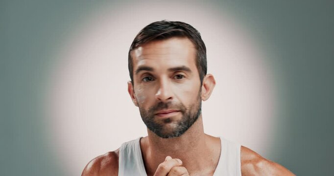Man, face and cream with skincare for moisturizer, facial treatment or hygiene on a studio background. Portrait, male person or model with lotion, cosmetic product or SPF for skin glow on space