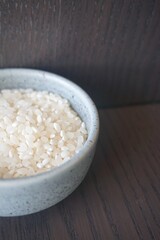 White rice on a dark background. organic asian food.