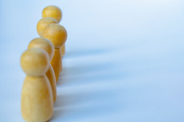 A wooden figure speaking up. Representing satisfaction or happy with something