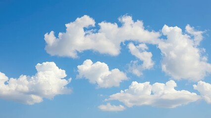 Clouds of varying shapes and sizes drift across a clear blue sky, clouds, sizes