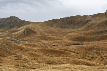 Zabljak, Montenegro - 19 August 2024 Remote house surrounded by hills