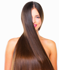 Obraz premium Haircare, smile and portrait of girl in studio for natural keratin treatment, shampoo or healthy glow. Cosmetics, results and face of woman with long hair, wellness and confidence on white background