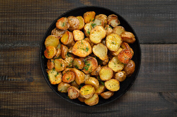 Roasted potato on plate, vegetarian food