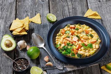 white bean chickpea chili with sausages, zucchini