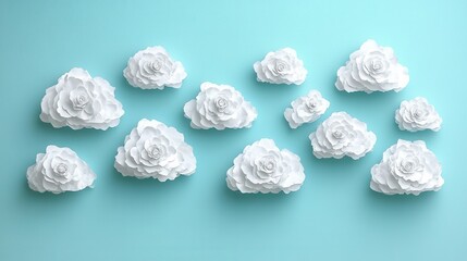 Obraz premium Dreamy sky with fluffy white paper clouds on a light blue background creating a serene and calming atmosphere perfect for wallpapers and backgrounds