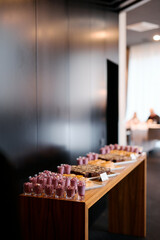 Colorful fruit desserts on the buffet table of the hotel