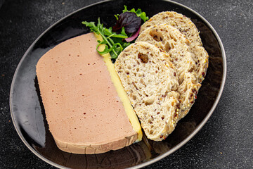 Liver mousse pate duck poultry meat tasty fresh delicious gourmet food background table rustic food...