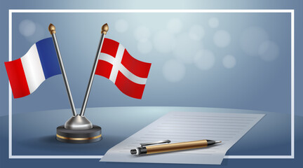 France and Denmark National flags on small table with bokeh background, cooperative relationship. Template vector Illustration