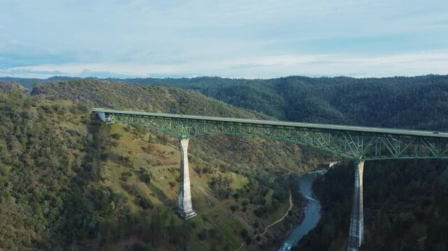 Drone Footage. Drone orbit around a high bridge over a canyon counterclockwise