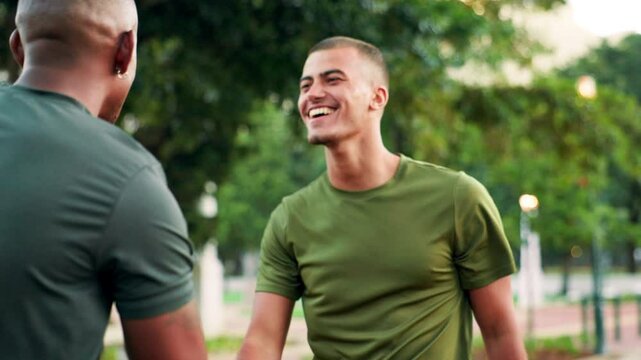 Fitness, friends and men with handshake together outdoor, welcome and hello for greeting. Smile, hug and embrace sport athlete, team talking and introduction of personal trainer with wind at park