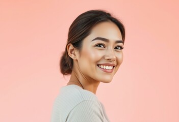 Fototapeta premium Photorealistic portrait of a smiling female on a warm pastel-colored background