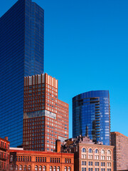 Boston City Skyline, Skyscrapers, and Industrial Buildings and Architecture along I-93 Interstate Highway in Massachusetts, USA: A landmark metropolitan cityscape of New England of America.