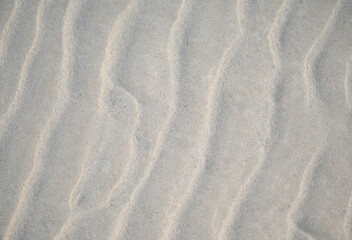beach sand background with natural wave pattern by nature.