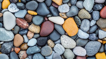 Diverse Collection of Smooth Pebbles in Various Natural Colors