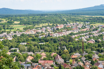 Aerial view of a European garden city, with family and apartment buildings surrounded by green areas