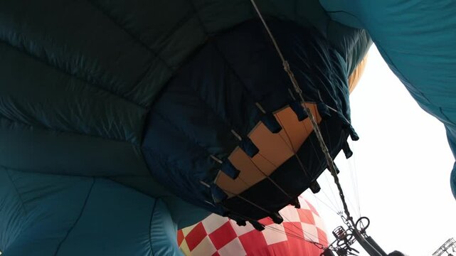 Handheld Fire Frame Under Hot Air Balloon Scene. Funny Balloon Festival Activity