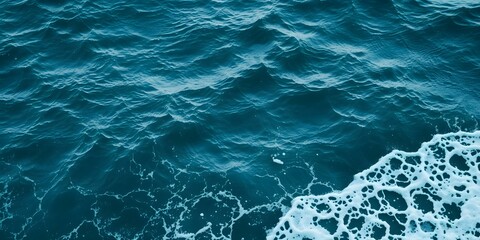 Ocean's Breath: A captivating view of the boundless ocean, with its rhythmic waves crashing and churning, creating a symphony of blue and white. Capturing the vastness and power of nature.