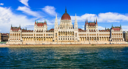 Fototapeta premium Budapest capital city of Hungary. Iconic view of Parlament (hungarian parliament) over Danube river. Famous european travel destinations