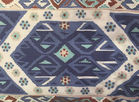 Cultural printed blue fabric pattern with hexagon, dots, triangles, steps pattern